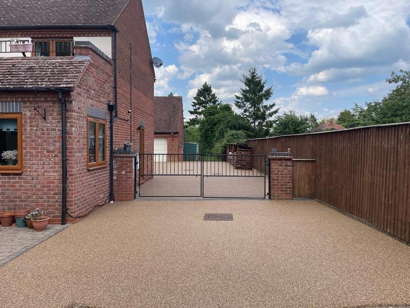 Gated driveway — resin bound project by National Surfacing