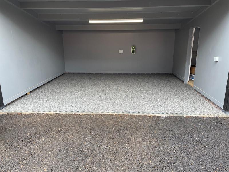 Resin bound garage floor in a modern home