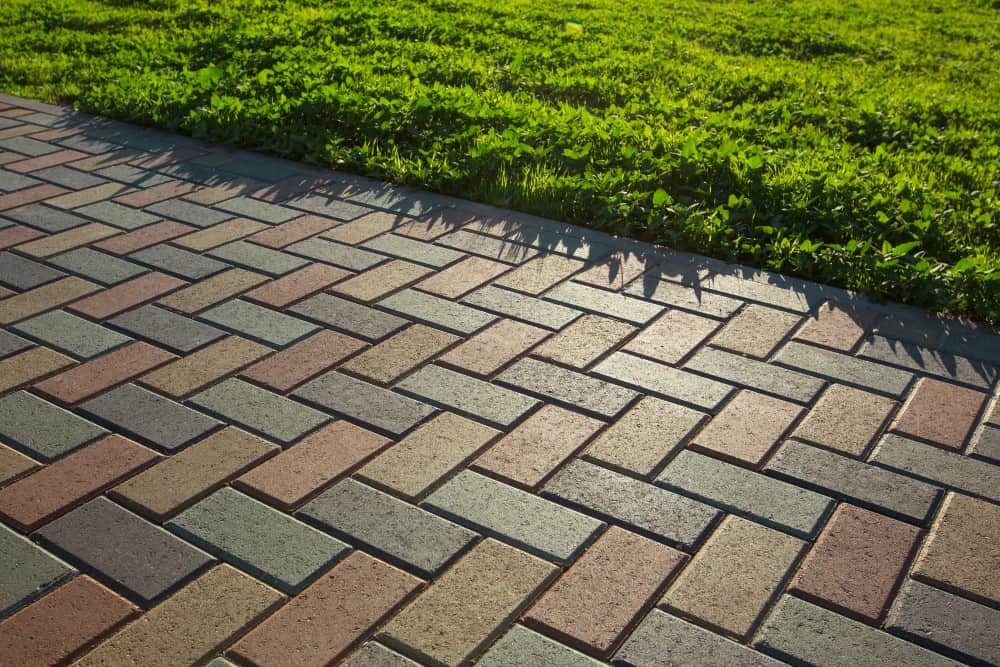 Herringbone block paving in contrasting brick tones
